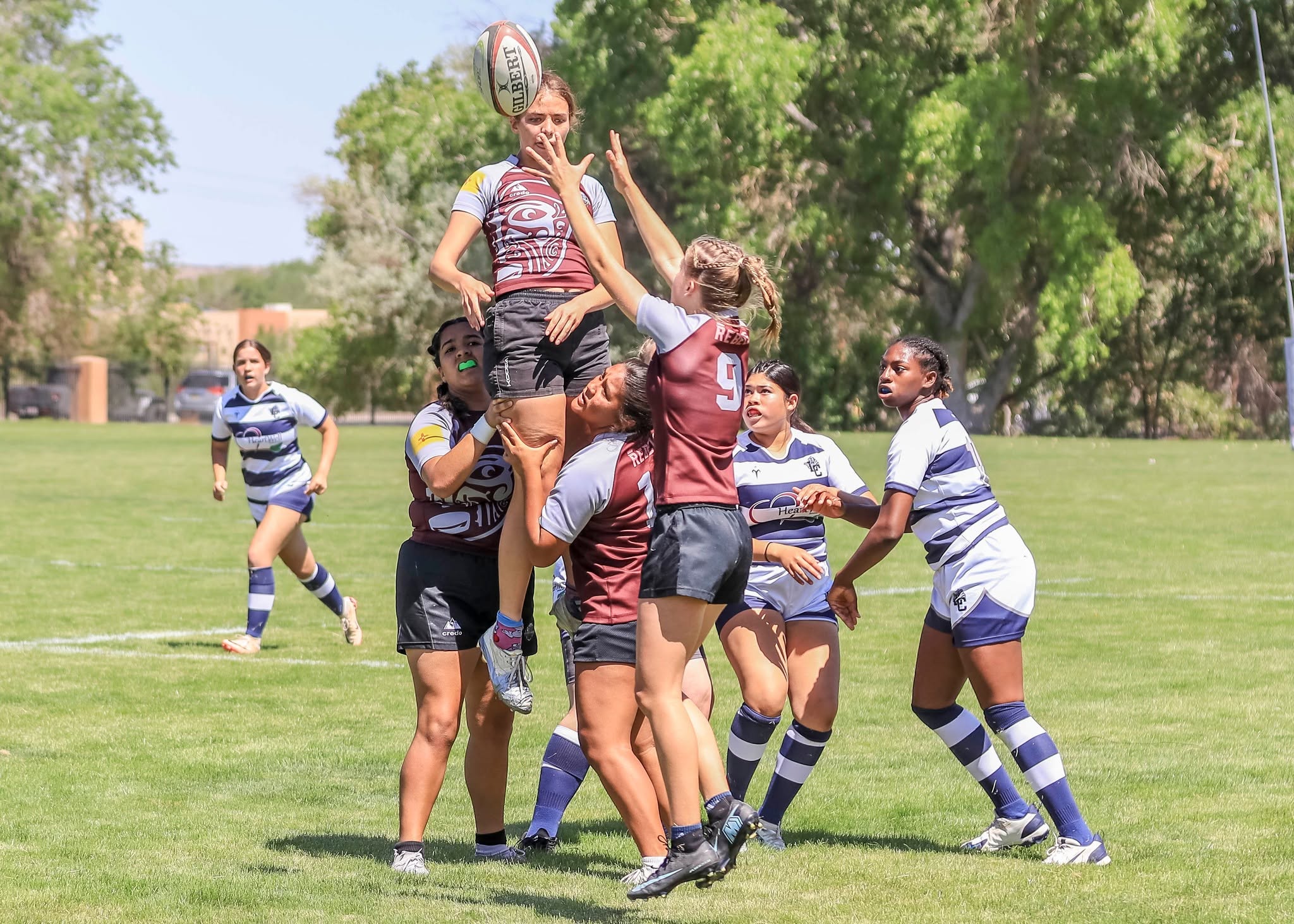 Rio Rancho high school girls competing for the ball at a lineout